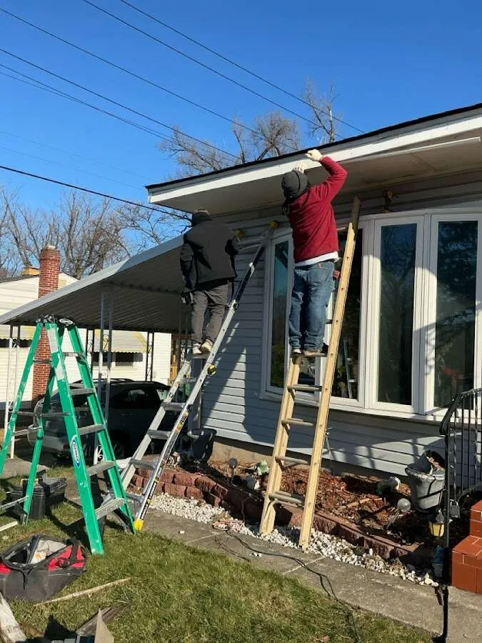 Restoration crew performing exterior repair in Friendswood